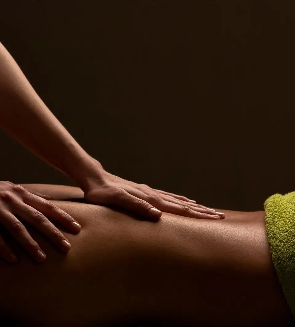 Therapeutic massage hands on client back